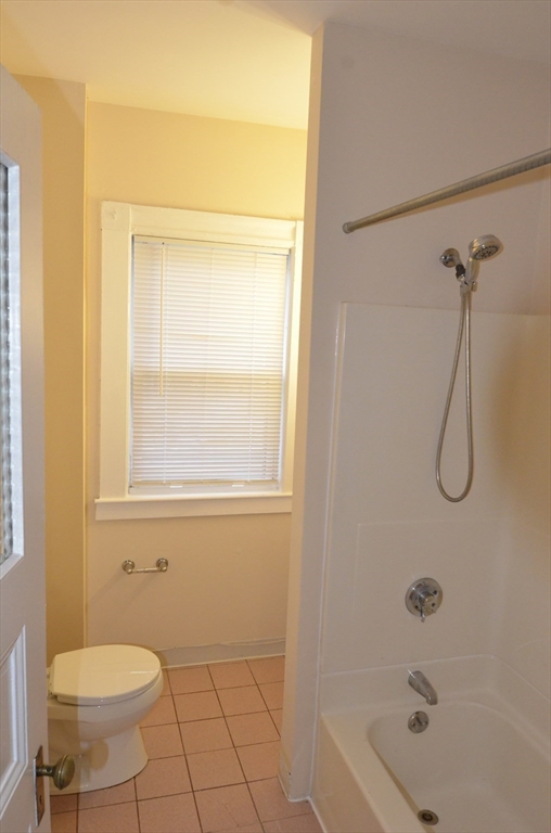 34 Channing Street, Unit 2 Newton, MA 02458 - Photo 11 of 23 a bathroom with a toilet and a shower