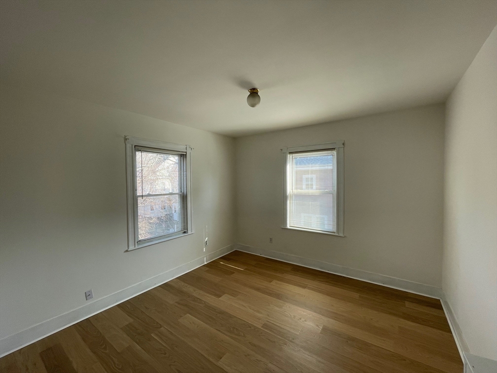 34 Channing Street, Unit 2 Newton, MA 02458 - Photo 17 of 23 an empty room with a window