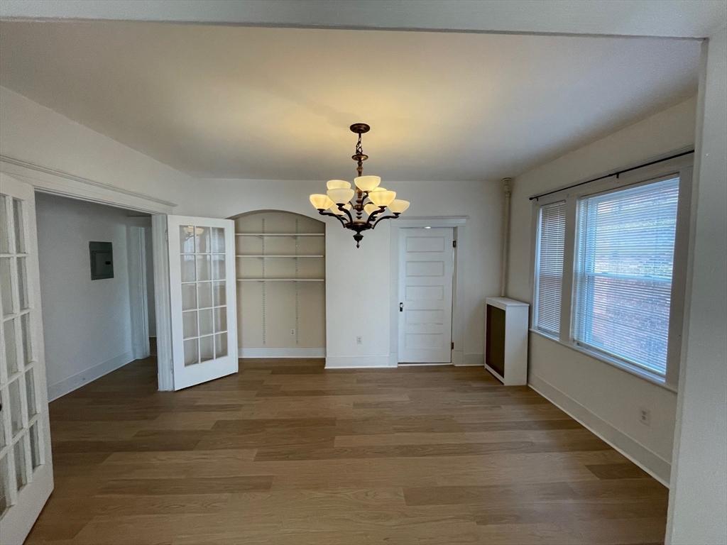 34 Channing Street, Unit 2 Newton, MA 02458 - Photo 6 of 23 a view of a chandelier in an empty room