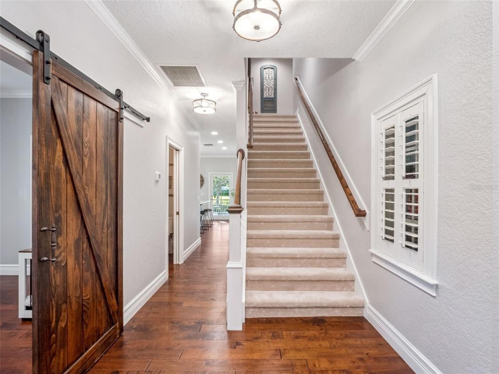 2509 Ridgewind Way Windermere, FL 34786 - Photo 18 of 38 a view of an entryway with wooden floor