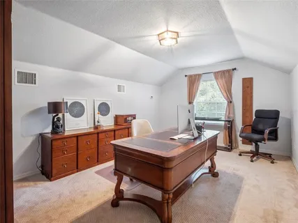 a room with furniture and window