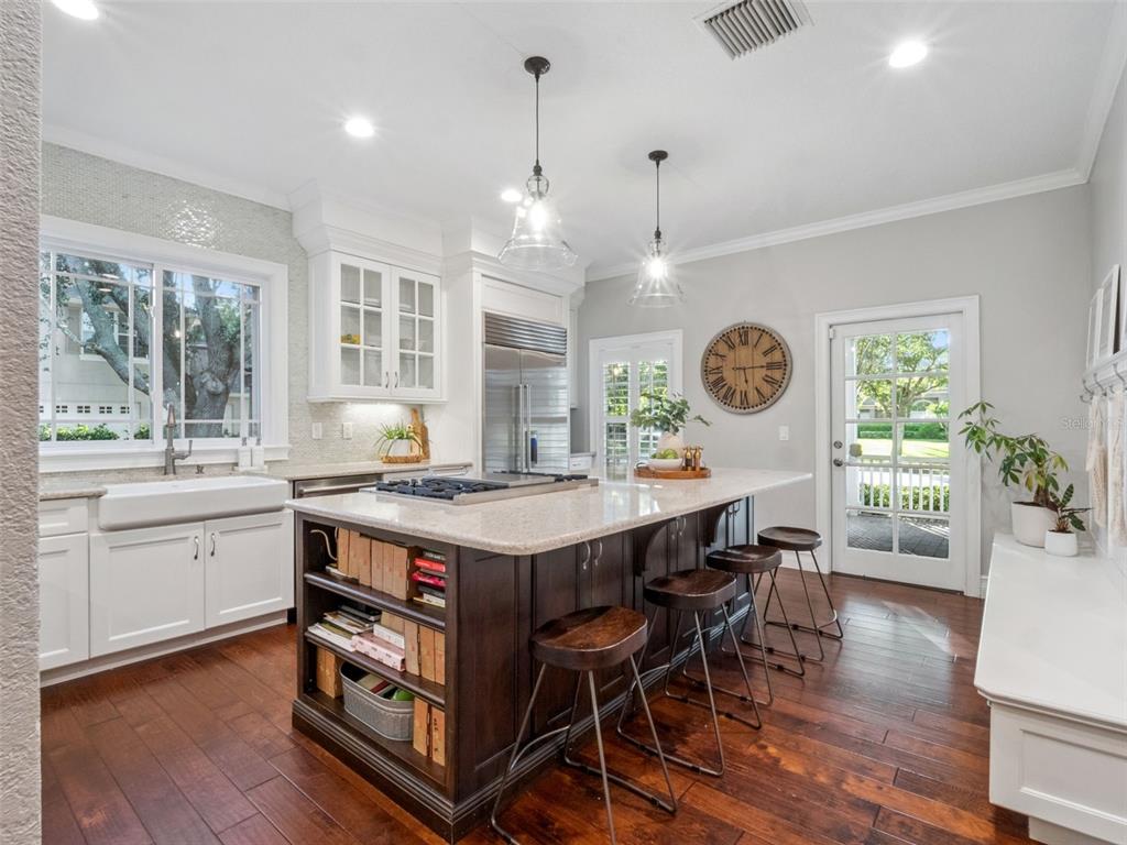 2509 Ridgewind Way Windermere, FL 34786 - Photo 9 of 38 a large kitchen with a table and chairs in it