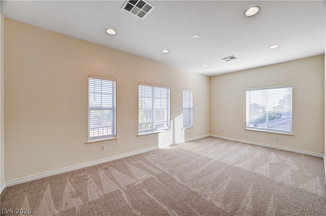 6761 Clay TABLET Street Las Vegas, NV 89149 - Photo 46 of 73 Recessed lighting and soft carpeting define this versatile upper-level living space.