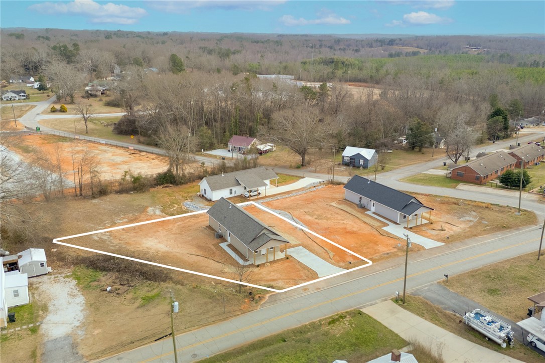 115 Riley Street Westminster, SC 29693 - Photo 33 of 46 This aerial view showcases a residential lot, offering ample space for potential development.