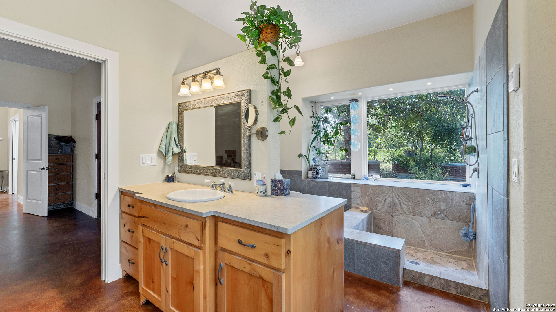 475 Jackson Road Kingsbury, TX 78638 - Photo 23 of 44 a bathroom with a sink and a mirror