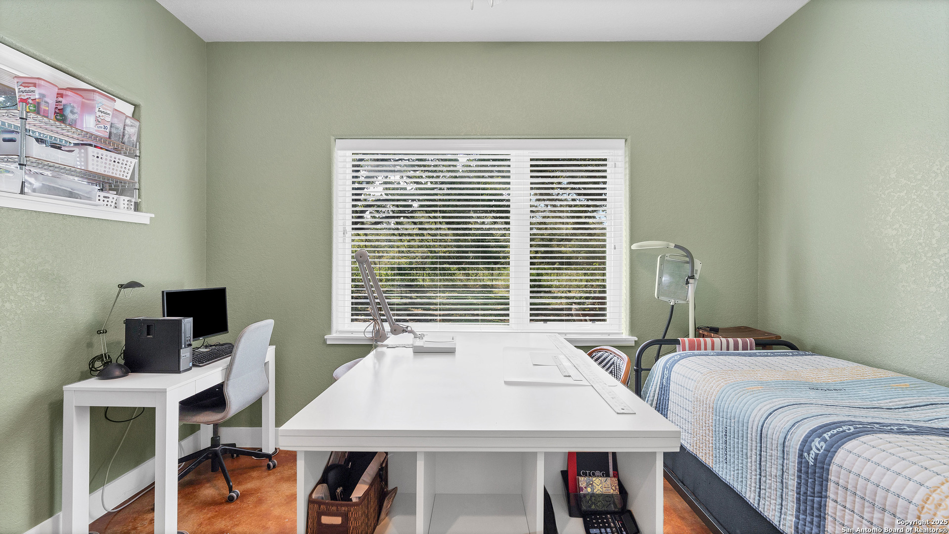 475 Jackson Road Kingsbury, TX 78638 - Photo 31 of 44 a bedroom with a bed and a table in it