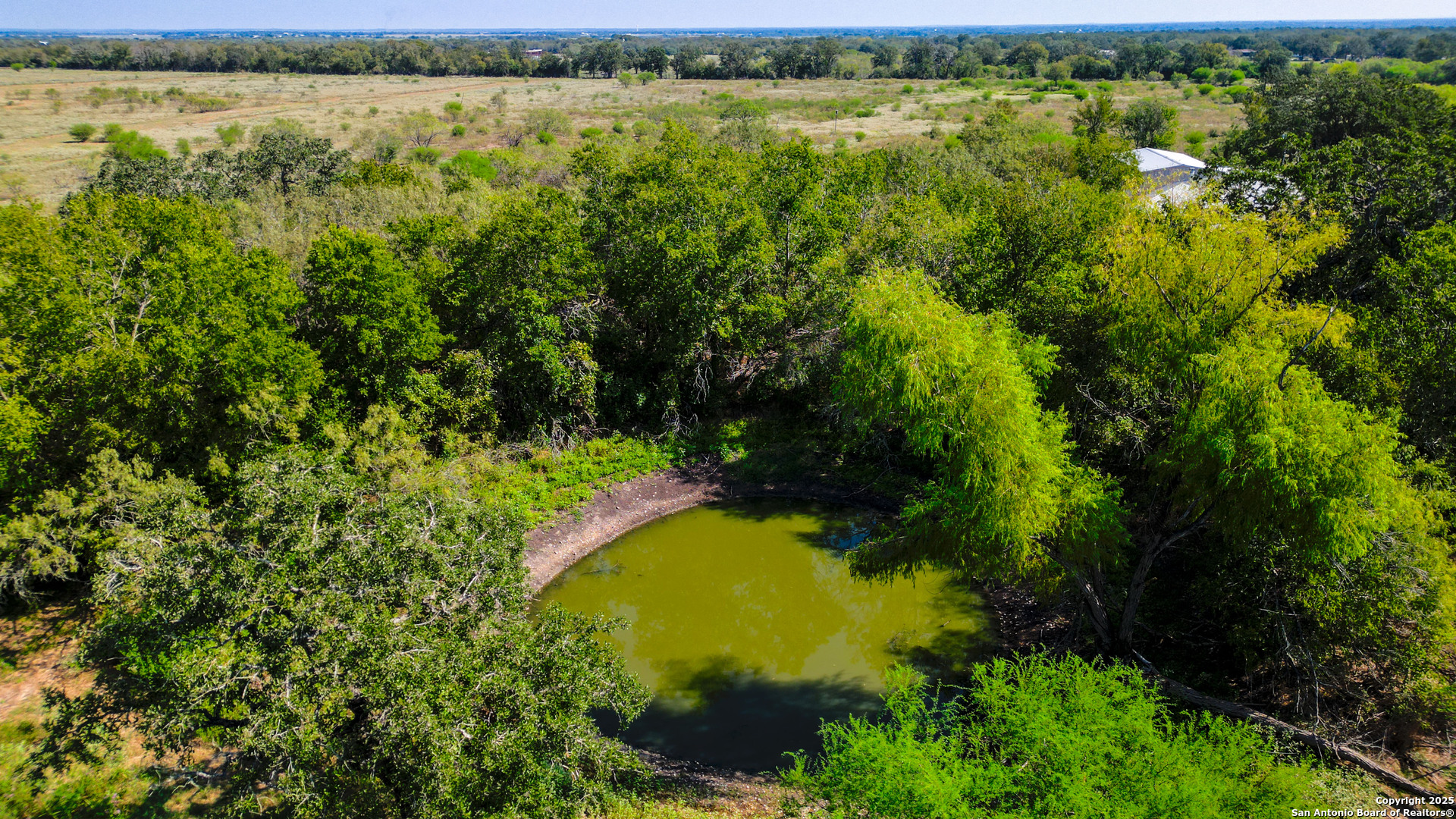 475 Jackson Road Kingsbury, TX 78638 - Photo 4 of 44 a view of an outdoor space and a lake view