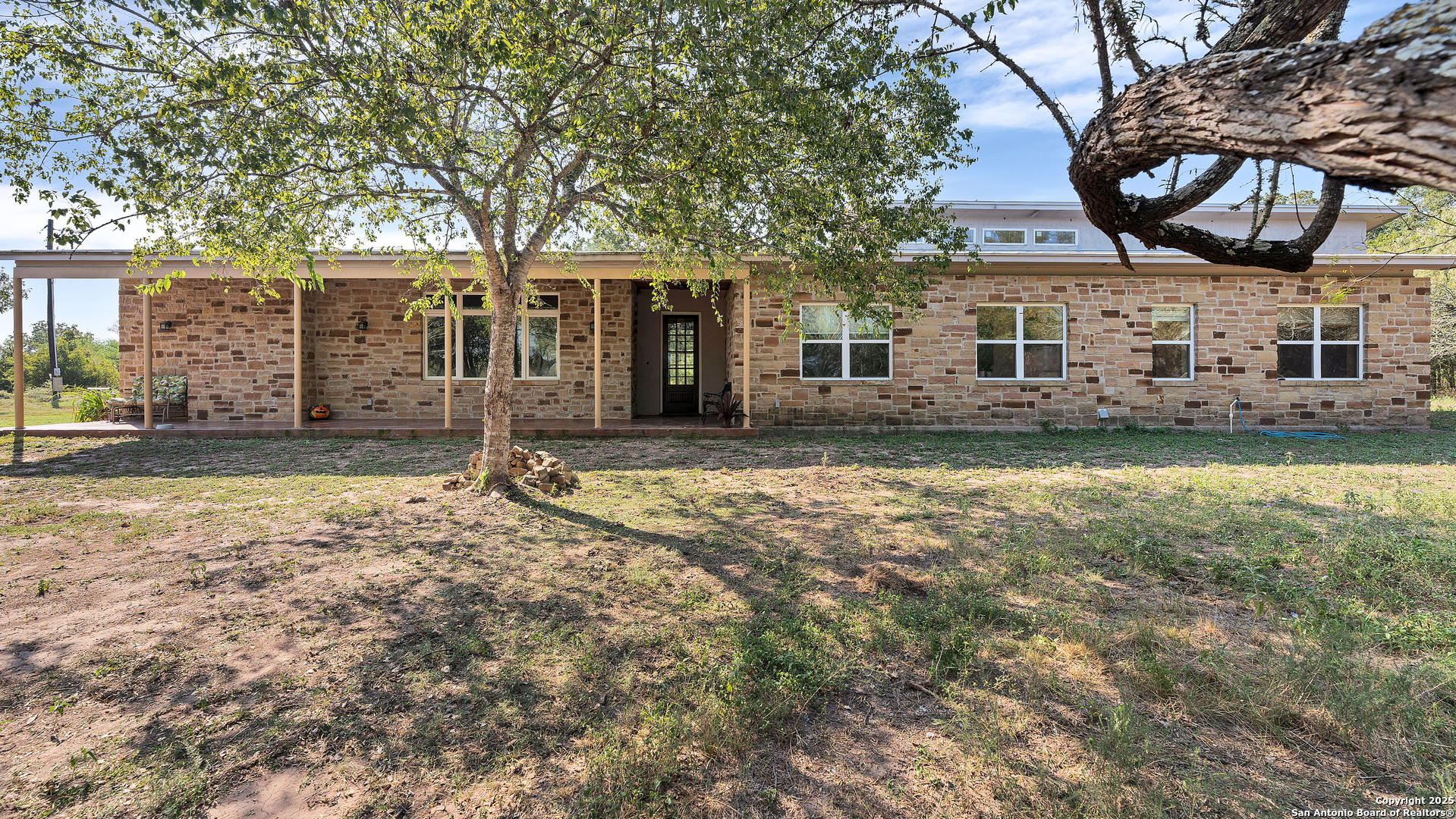 475 Jackson Road Kingsbury, TX 78638 - Photo 5 of 44 a front view of a house with a yard