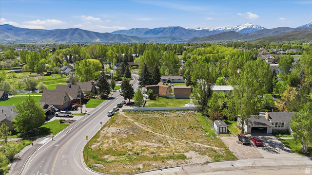 123 West 1050th North, Unit 41 Midway, UT 84049 - Photo 8 of 22 Expansive lot featuring a wide street frontage and a mountain backdrop