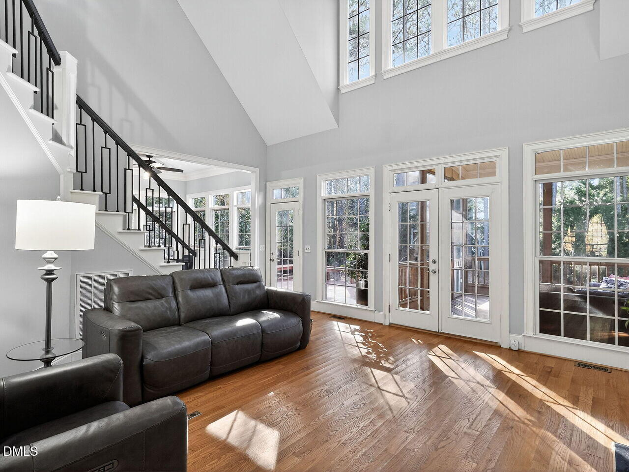 104 River Run Road Durham, NC 27712 - Photo 11 of 41 a living room with furniture and a large window