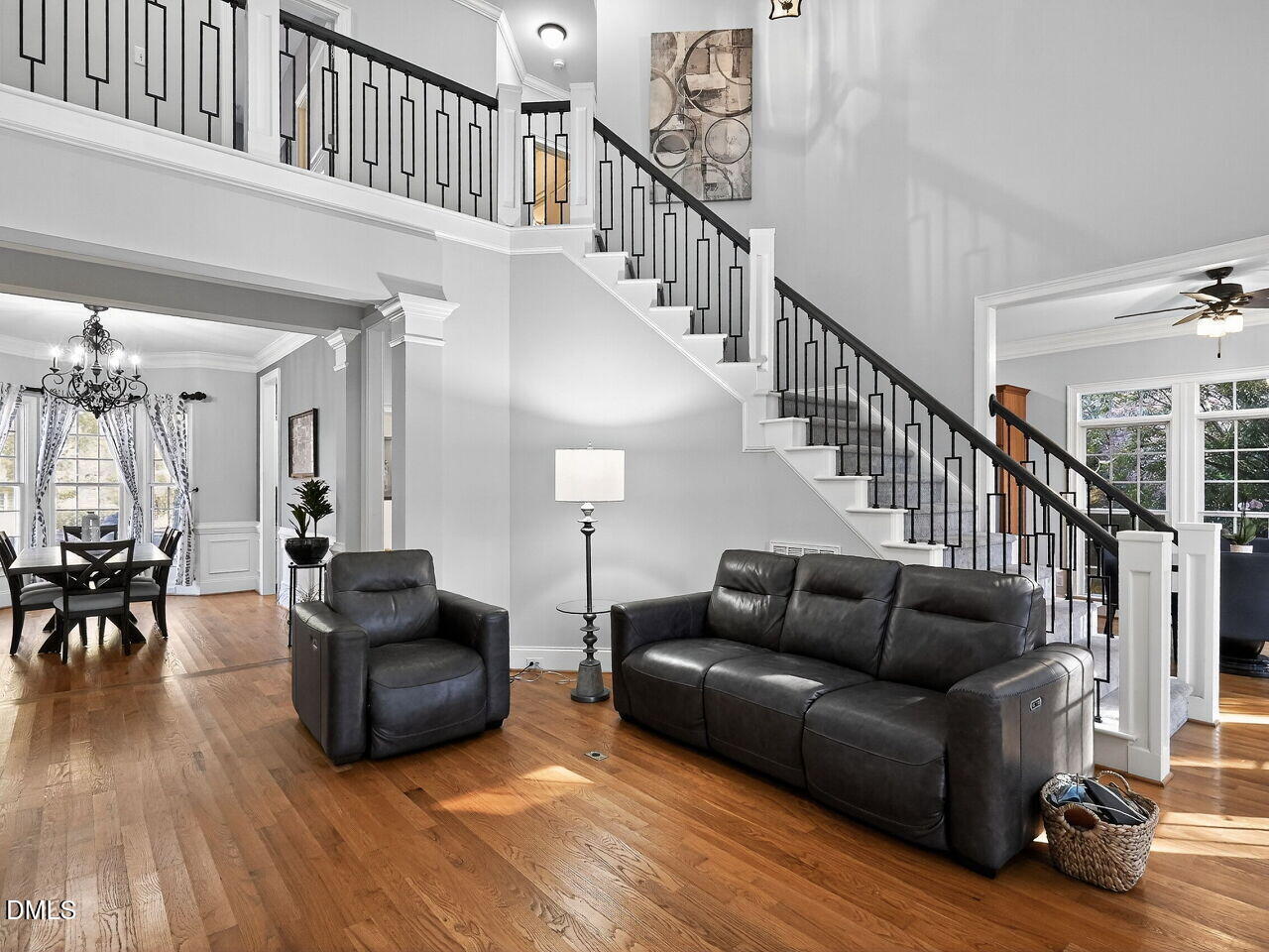 104 River Run Road Durham, NC 27712 - Photo 14 of 41 a living room with furniture and a wooden floor