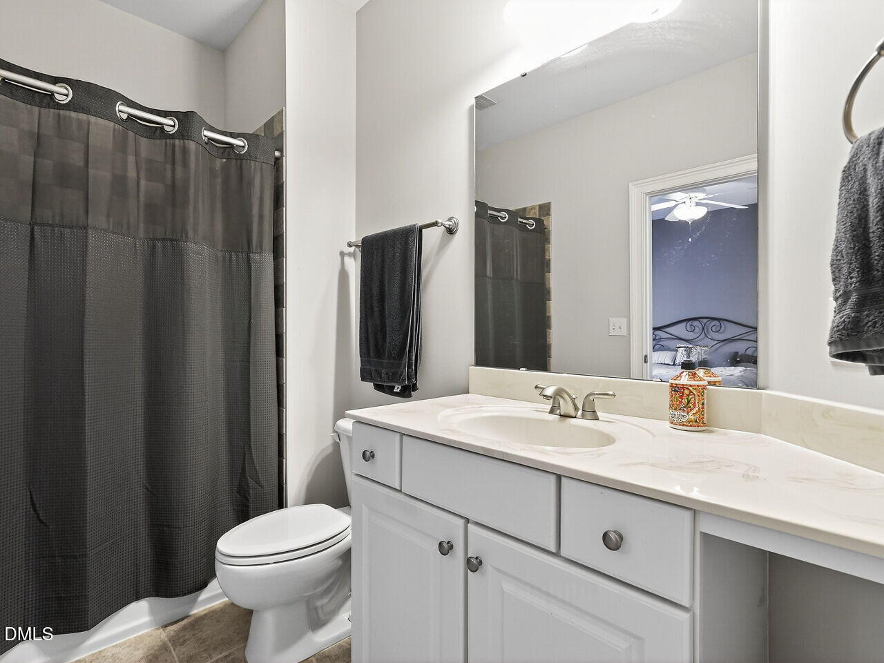 104 River Run Road Durham, NC 27712 - Photo 29 of 41 a bathroom with a sink toilet and shower