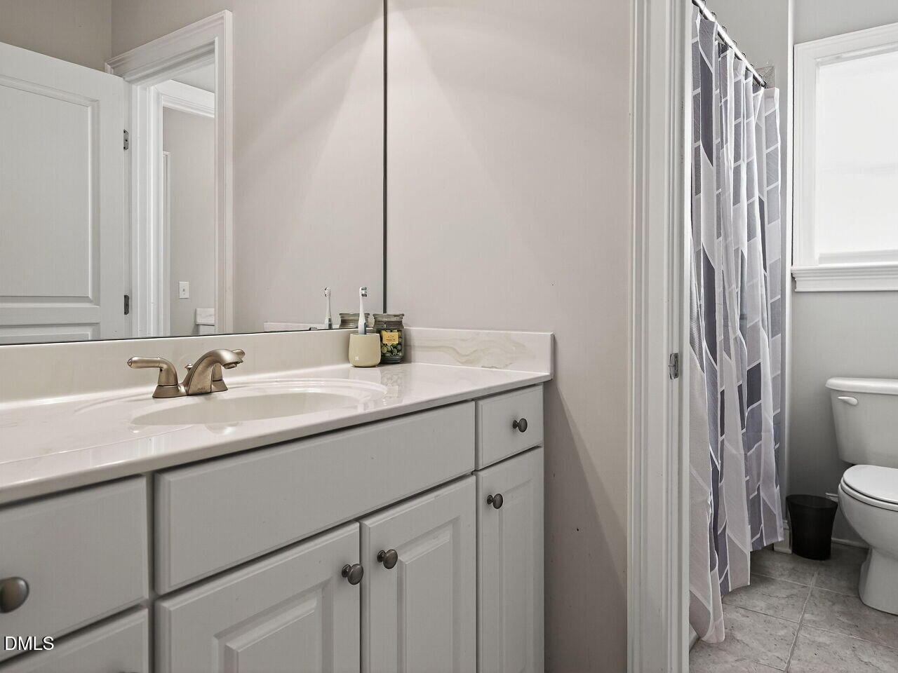 104 River Run Road Durham, NC 27712 - Photo 31 of 41 a bathroom with a sink and a toilet