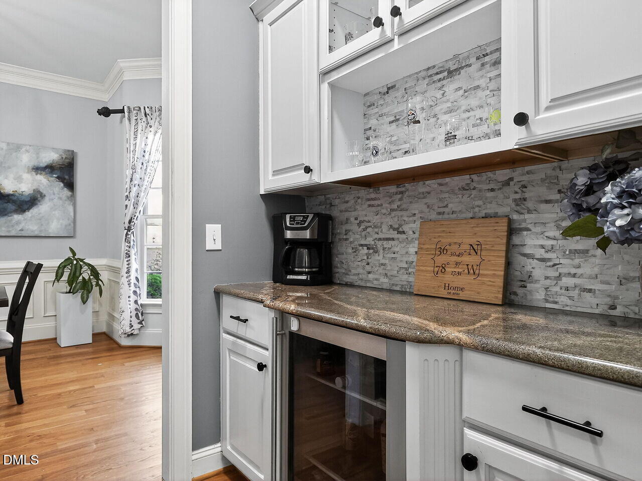 104 River Run Road Durham, NC 27712 - Photo 10 of 41 a kitchen with stainless steel appliances granite countertop a stove and a wooden floor