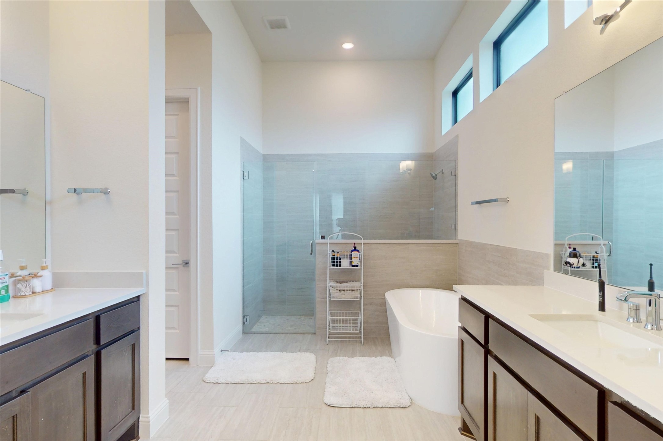 4611 Columbus Drive Manvel, TX 77583 - Photo 9 of 10 a bathroom with a sink a toilet and shower