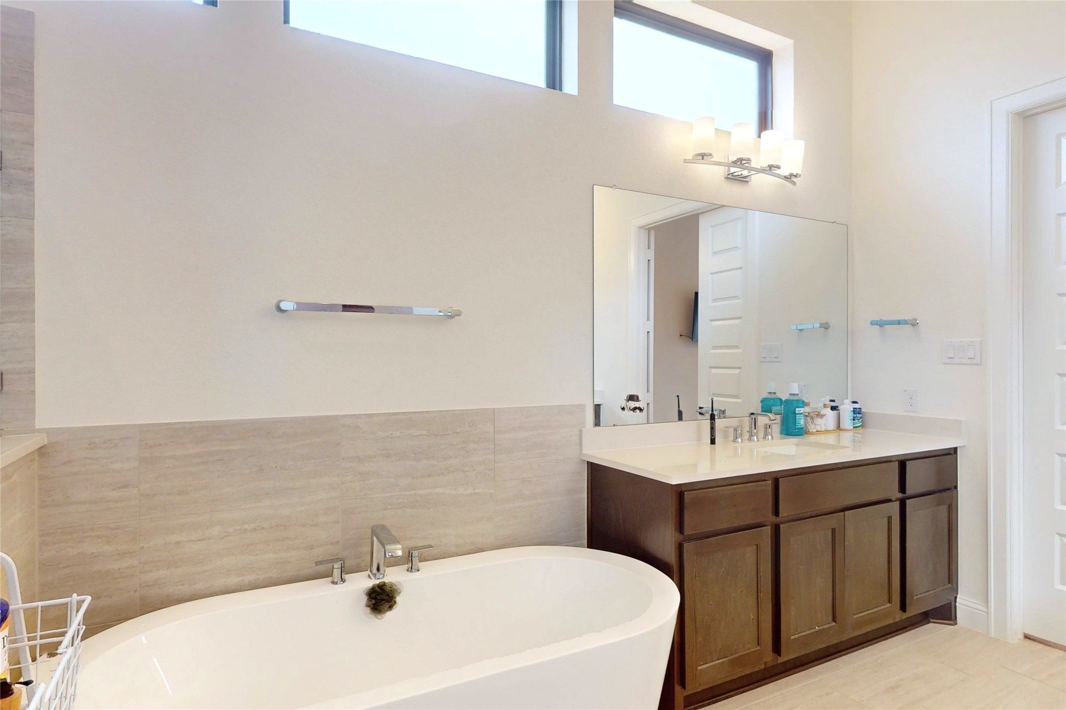 4611 Columbus Drive Manvel, TX 77583 - Photo 10 of 10 a bathroom with a sink and a mirror