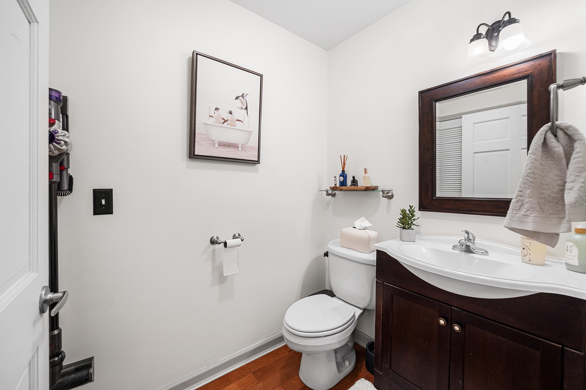 307 1st Street, Unit 2 Hoboken, NJ 07030 - Photo 12 of 20 a bathroom with a sink vanity and toilet