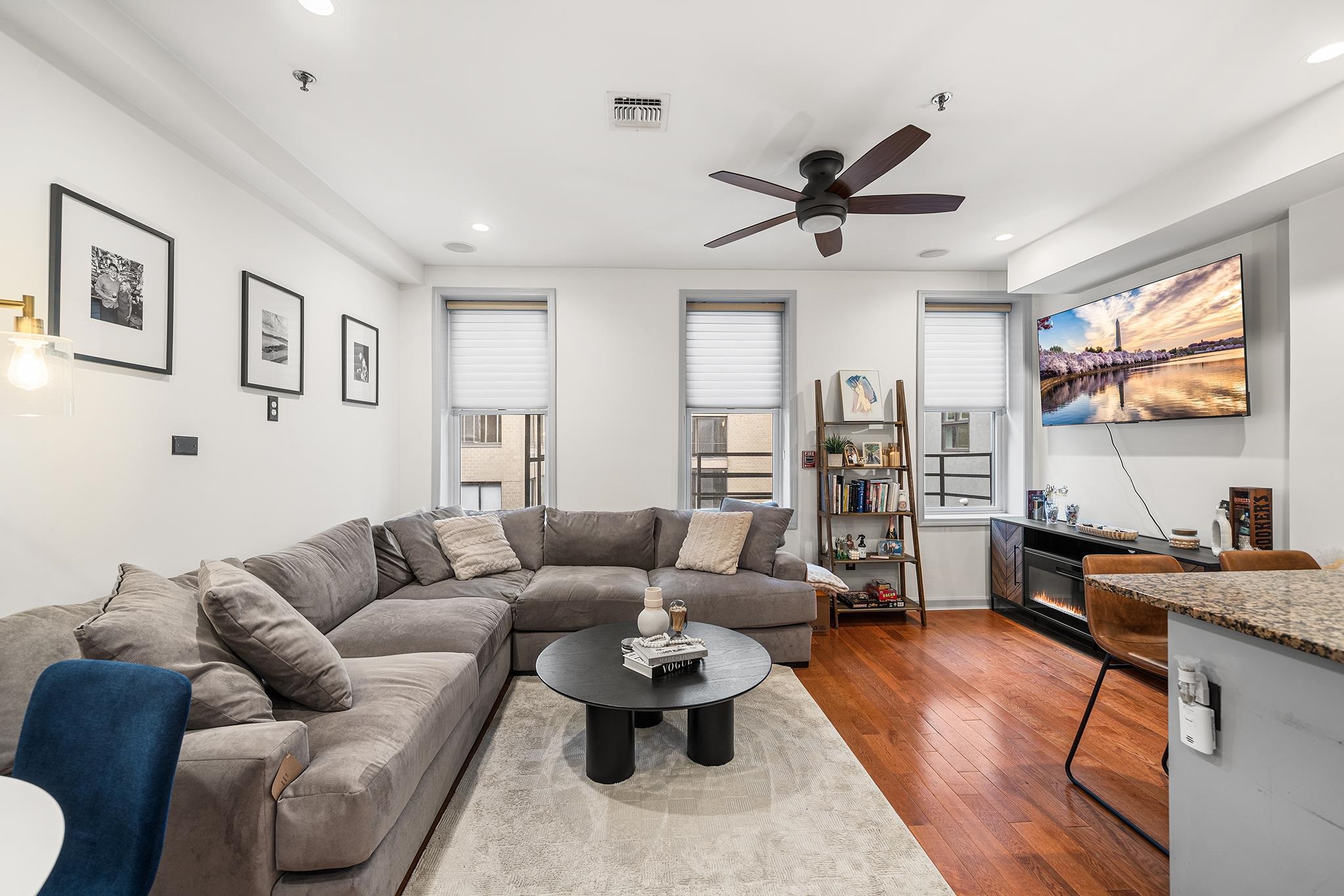 307 1st Street, Unit 2 Hoboken, NJ 07030 - Photo 6 of 20 a living room with furniture flat screen tv and window