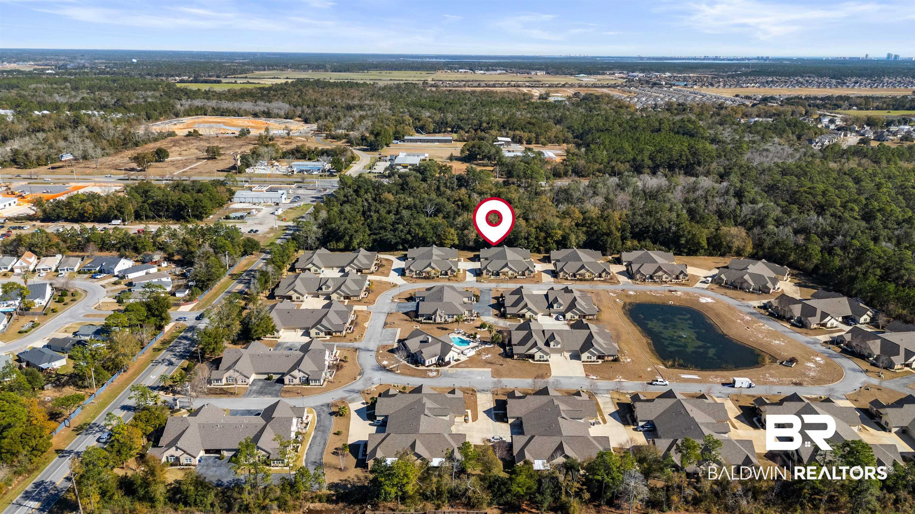 702 Holmes Avenue, Unit 702 Foley, AL 36535 - Photo 32 of 33 Drone / aerial view