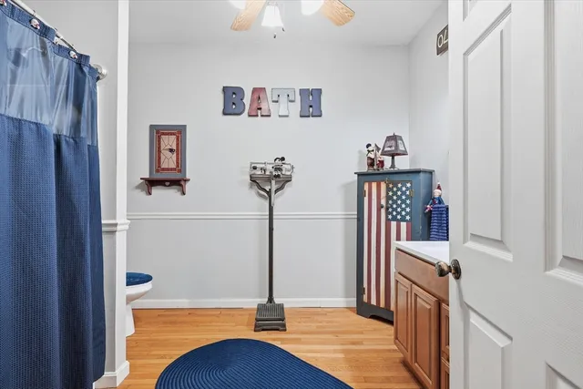 a bathroom with a sink a vanity and a mirror