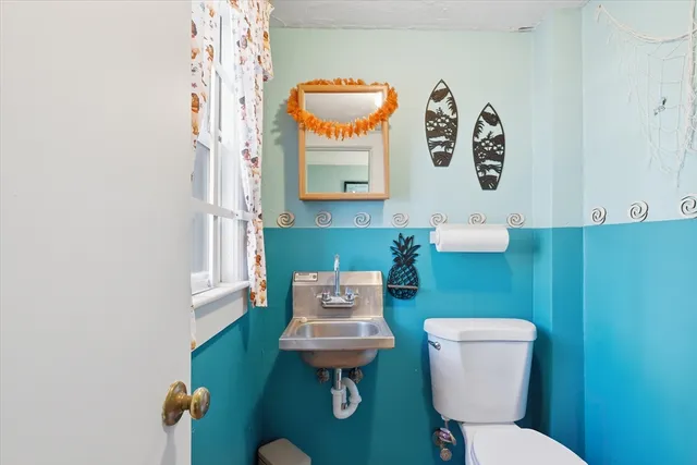 a view of an empty room with a closet