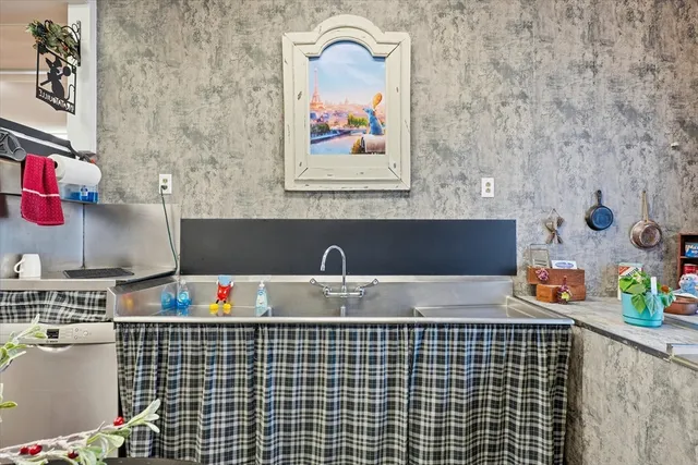 a bathroom with a sink and a bathtub