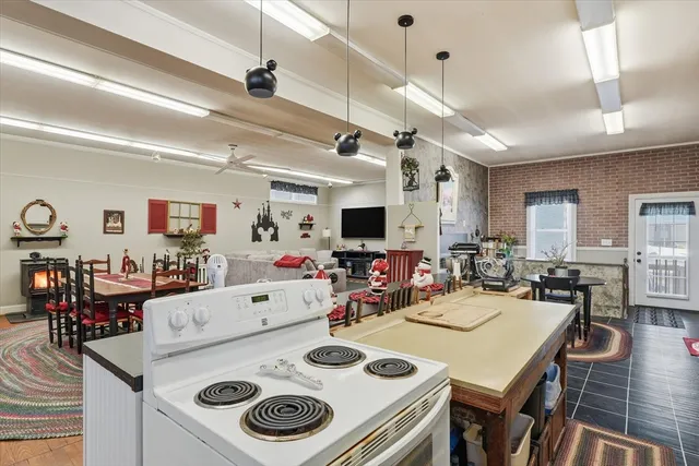 a view of kitchen dining table and chairs