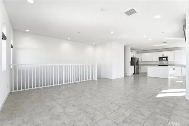 a large kitchen with cabinets