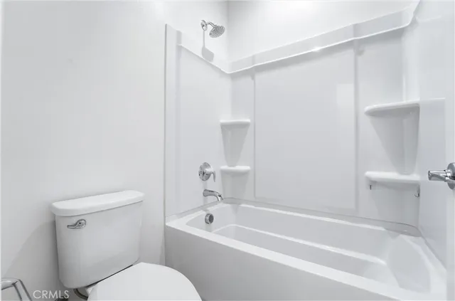 a view of a swimming pool with chairs