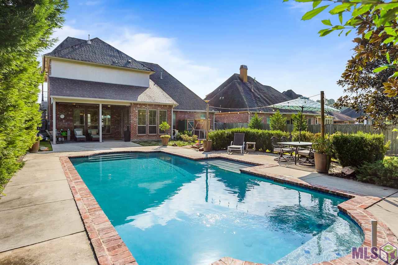 8150 Rustic Rose Drive Baton Rouge, LA 70818 - Photo 27 of 36 Sparkling Pool with Polaris