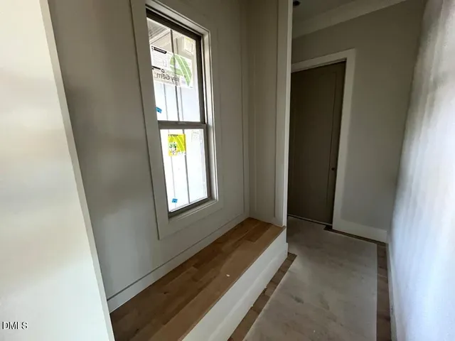 a view of an empty room and window