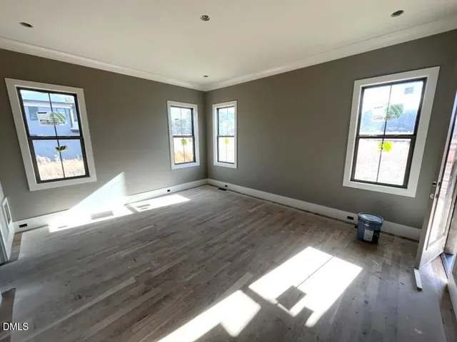 a view of livingroom with hardwood floor and a window