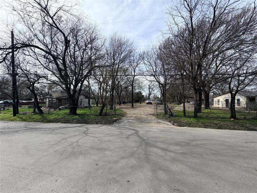 4151 Interurban Road Lancaster, TX 75134 - Photo 5 of 8 View of asphalt road featuring a residential view