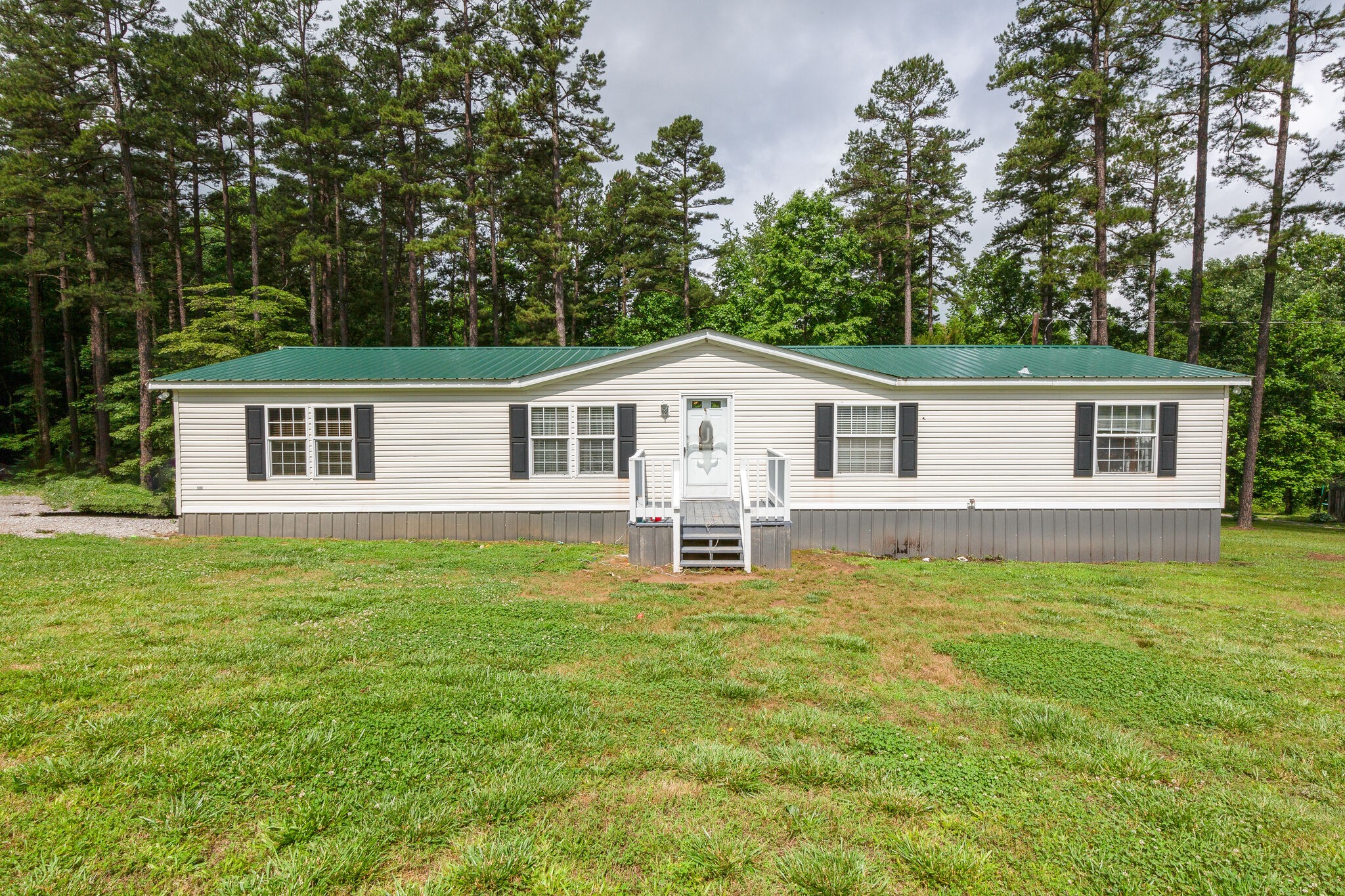 1054 Caps Ridge Dickson, TN 37055 - Photo 1 of 23 a view of a house with a backyard