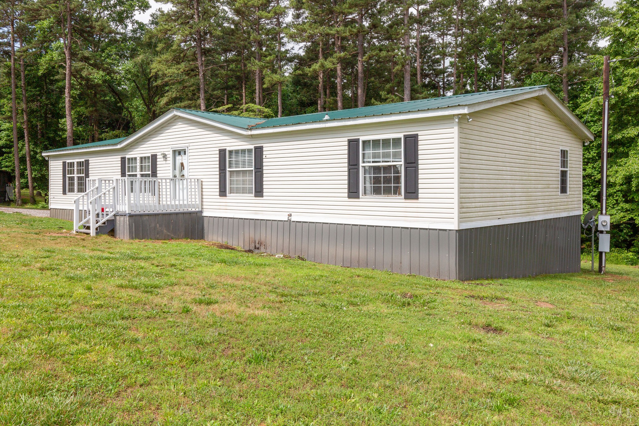 1054 Caps Ridge Dickson, TN 37055 - Photo 2 of 23 a view of a house with a yard