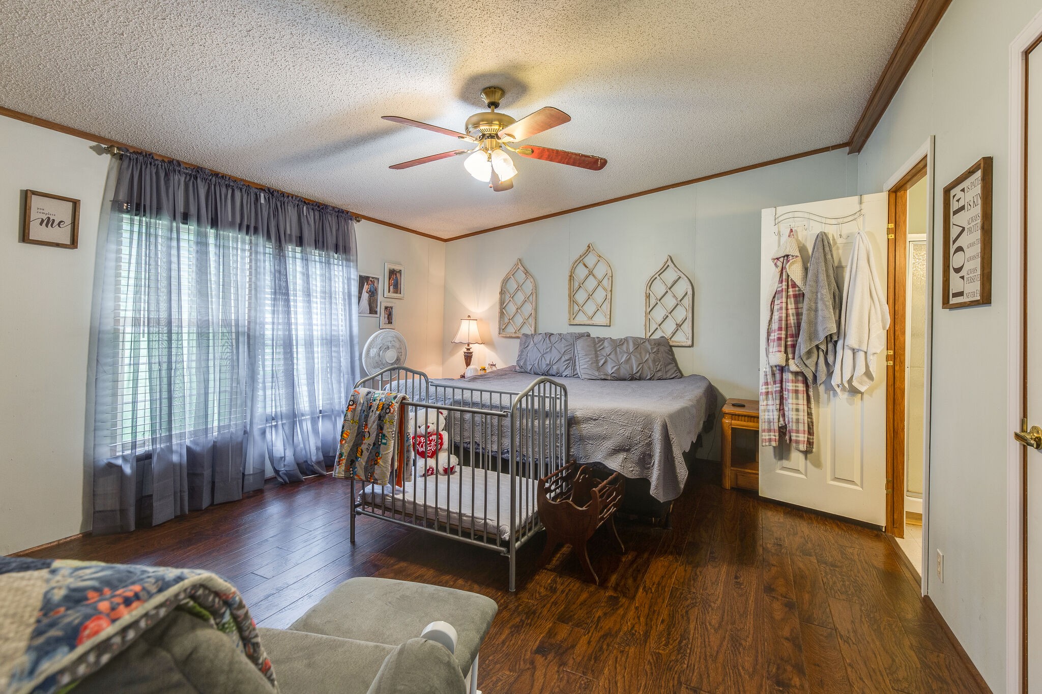 1054 Caps Ridge Dickson, TN 37055 - Photo 11 of 23 a bedroom with a bed and a window