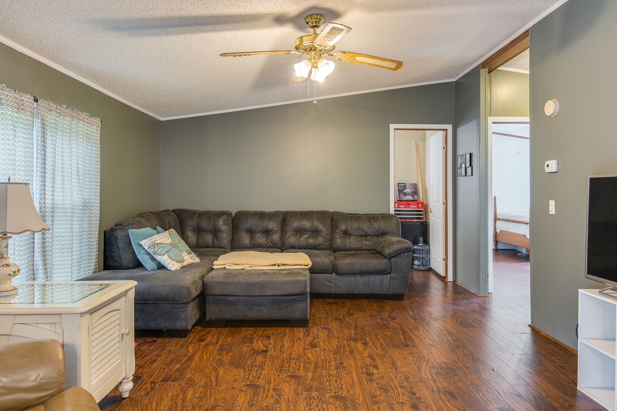 1054 Caps Ridge Dickson, TN 37055 - Photo 15 of 23 a living room with furniture and a wooden floor