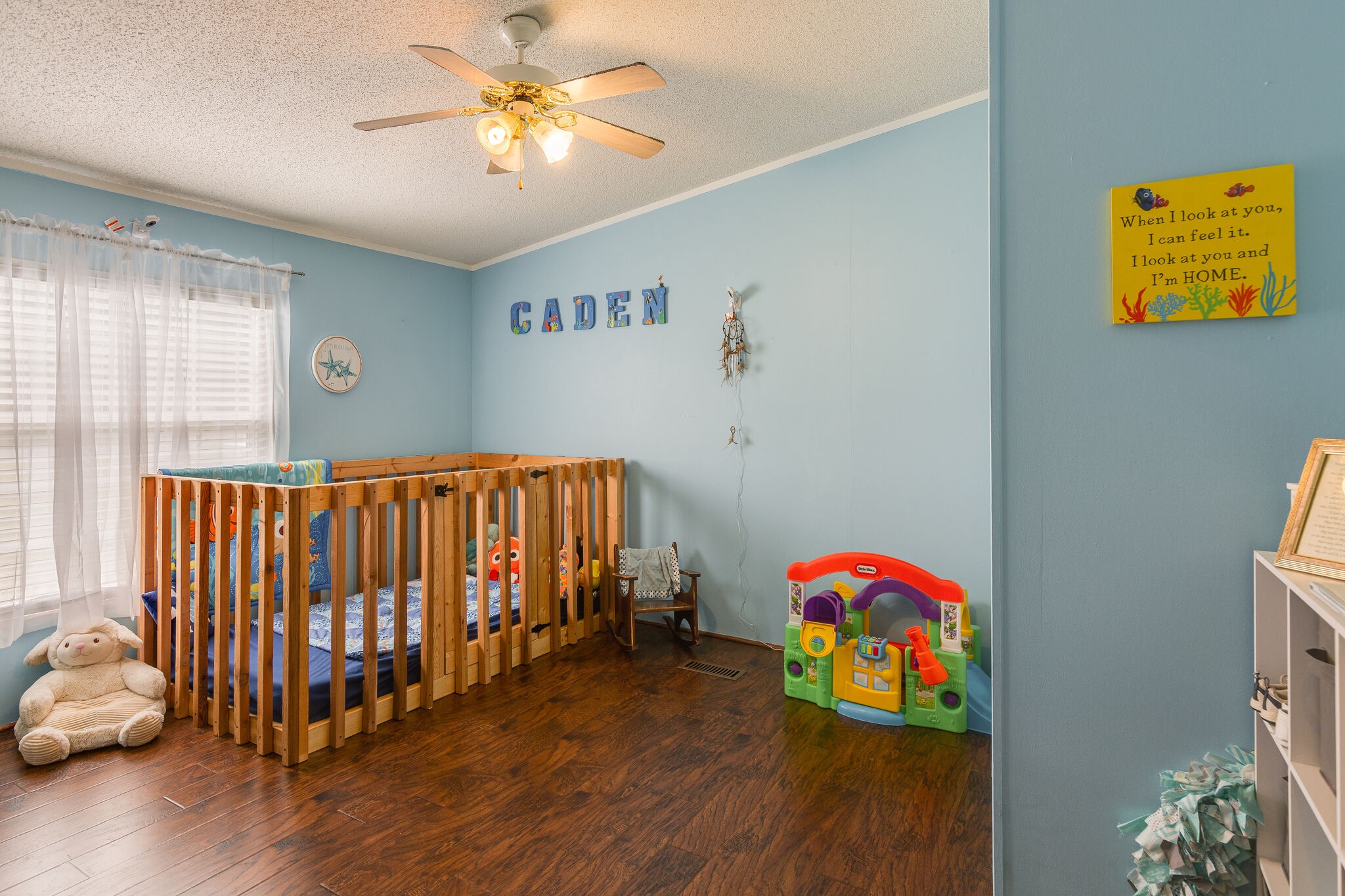 1054 Caps Ridge Dickson, TN 37055 - Photo 18 of 23 a bedroom with bed and wooden floor