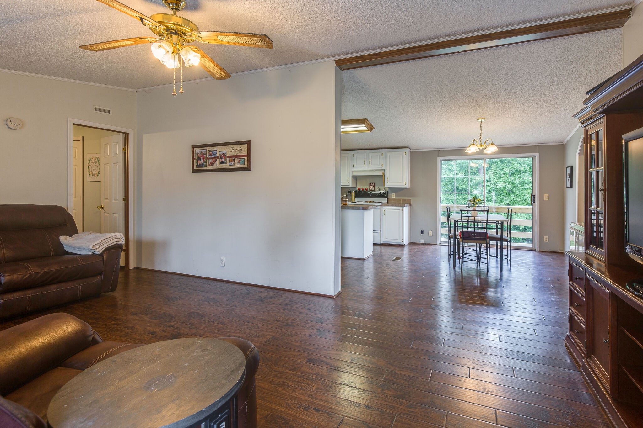 1054 Caps Ridge Dickson, TN 37055 - Photo 5 of 23 a living room with furniture and a wooden floor