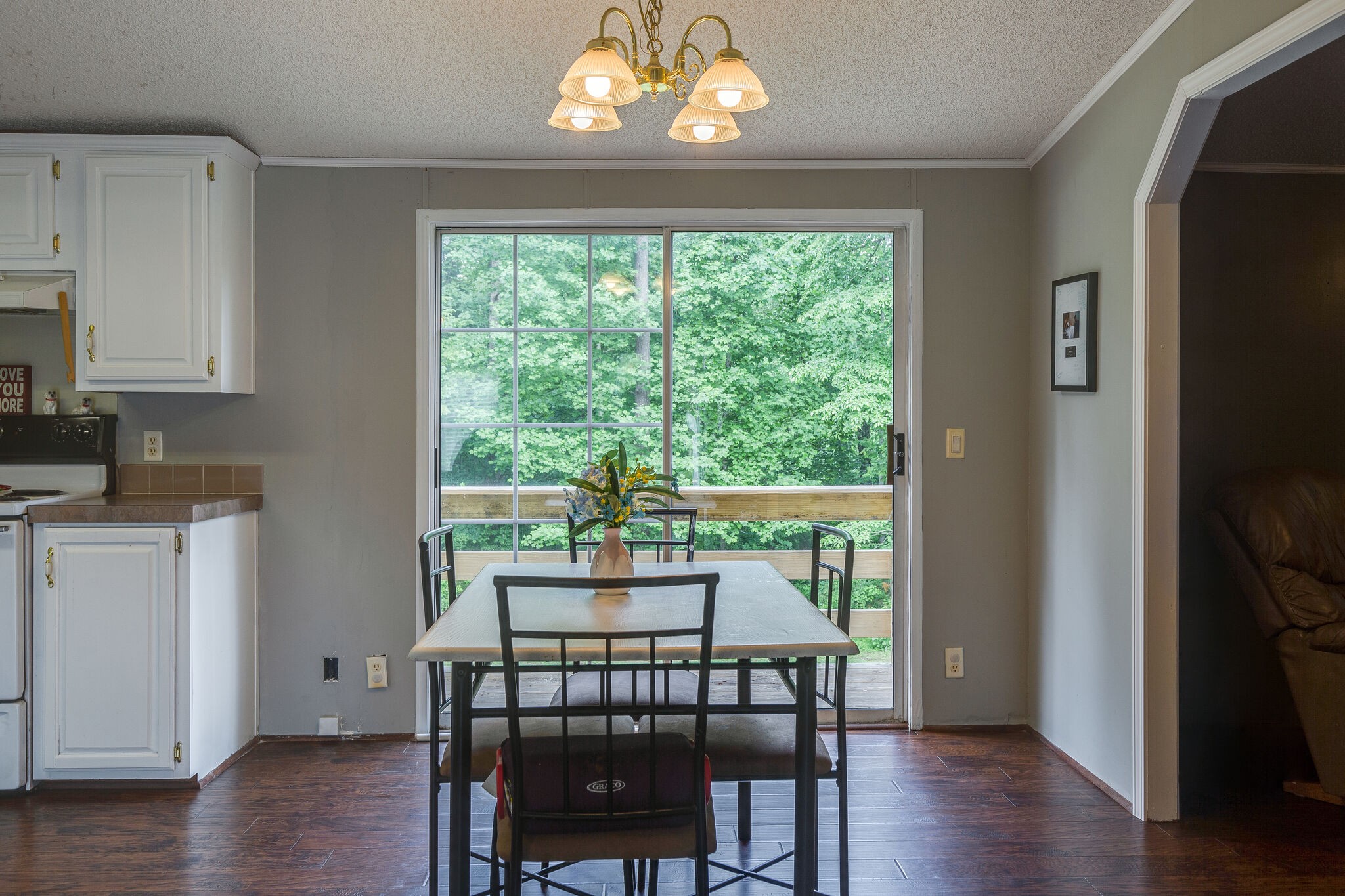 1054 Caps Ridge Dickson, TN 37055 - Photo 8 of 23 a view of a dining room with furniture window and wooden floor