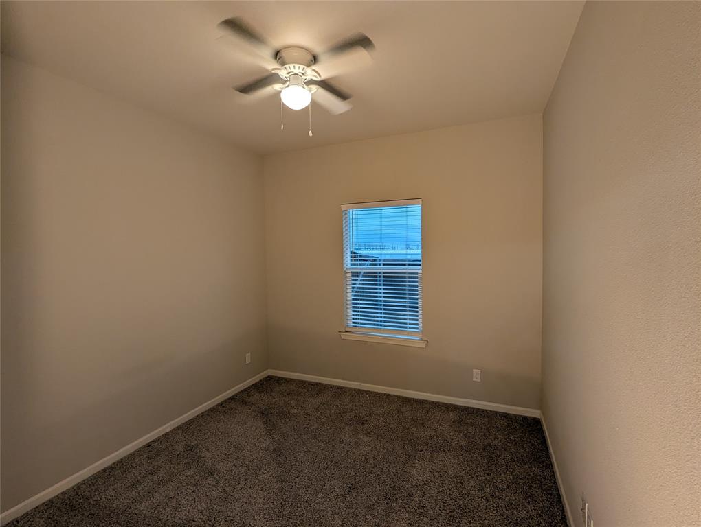 2700 Ginger Court Sherman, TX 75092 - Photo 11 of 22 an empty room with a window