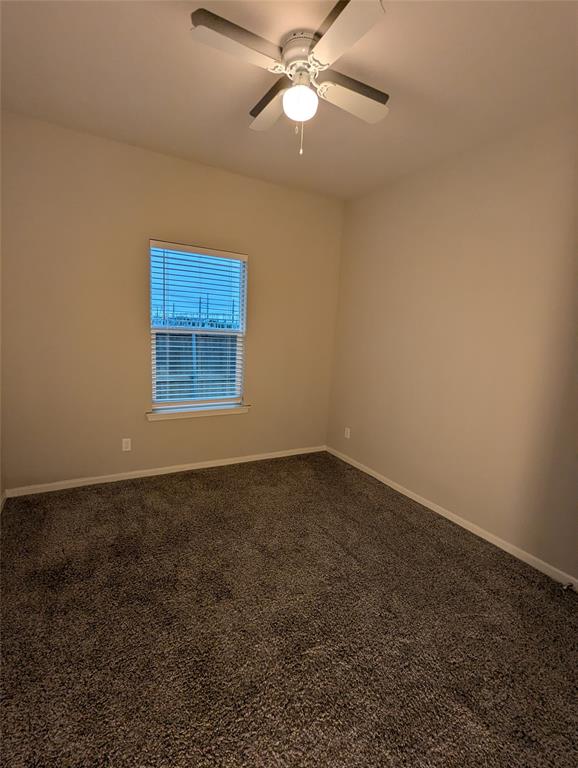 2700 Ginger Court Sherman, TX 75092 - Photo 18 of 22 an empty room with a fan & a window