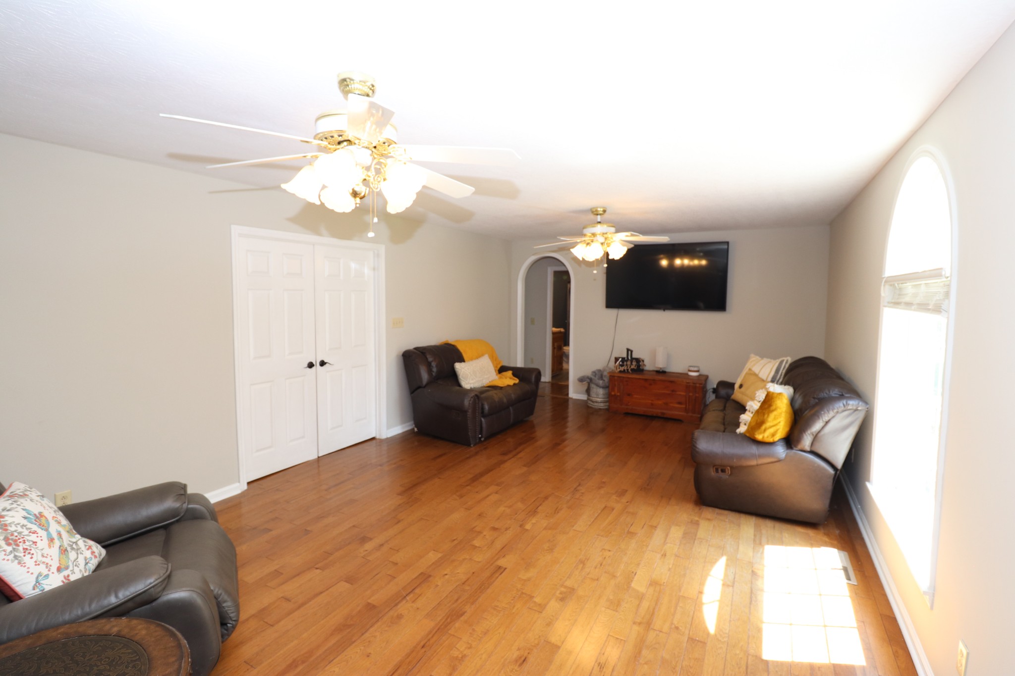 4753 Akersville Road Lafayette, TN 37083 - Photo 12 of 50 a living room with furniture and a flat screen tv