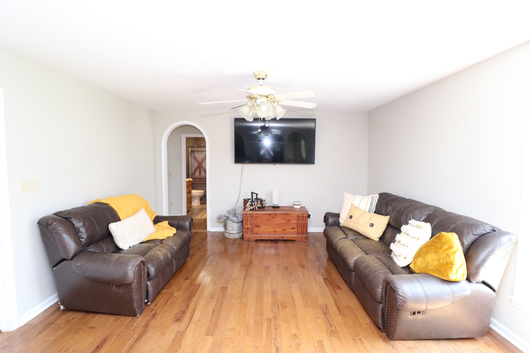 4753 Akersville Road Lafayette, TN 37083 - Photo 13 of 50 a living room with furniture and a flat screen tv