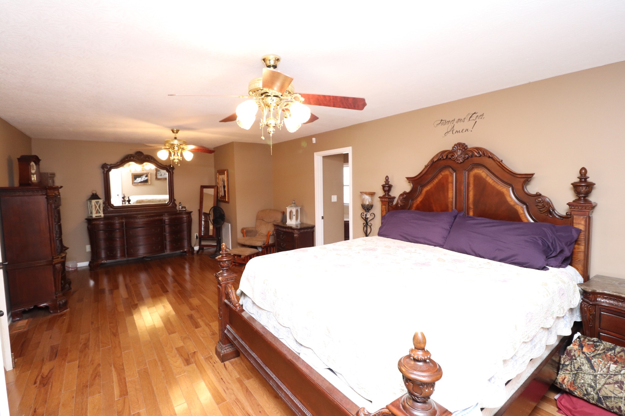 4753 Akersville Road Lafayette, TN 37083 - Photo 17 of 50 a living room with furniture and a chandelier