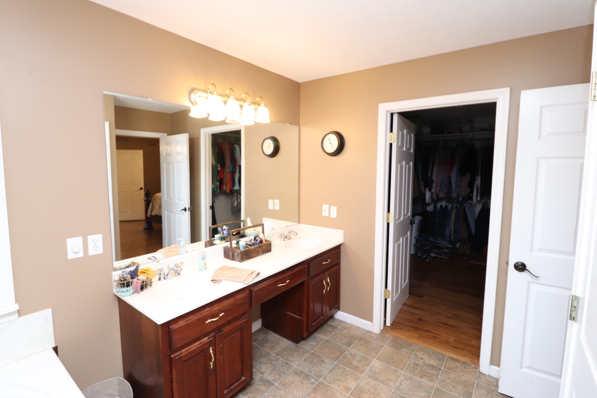 4753 Akersville Road Lafayette, TN 37083 - Photo 22 of 50 a bathroom with a sink and a mirror