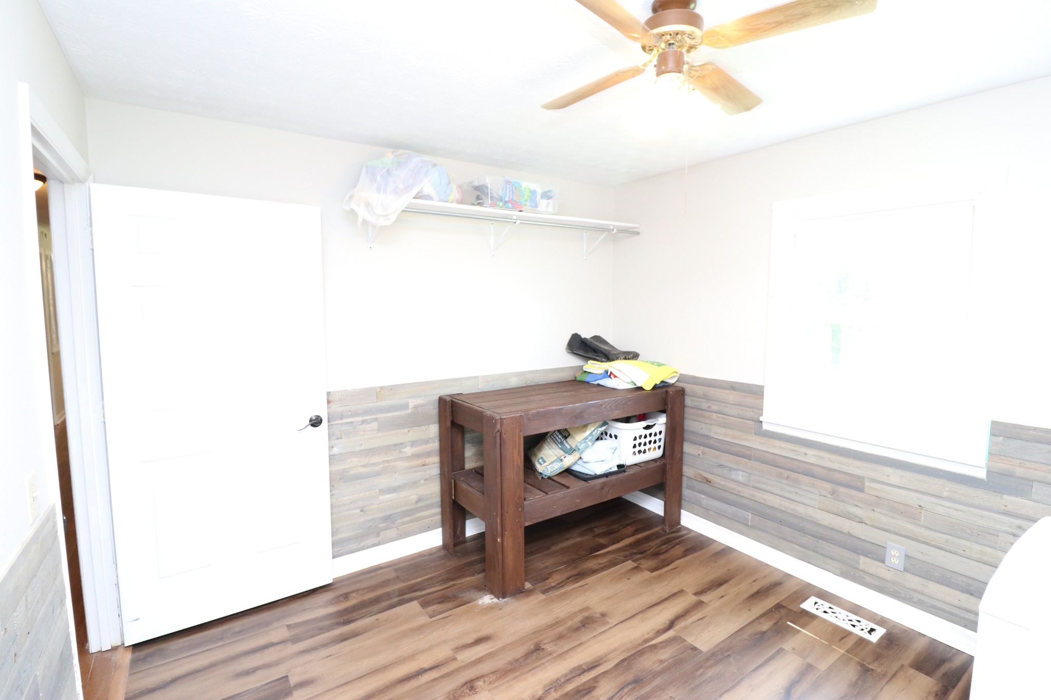 4753 Akersville Road Lafayette, TN 37083 - Photo 33 of 50 a living room with furniture and a wooden floor