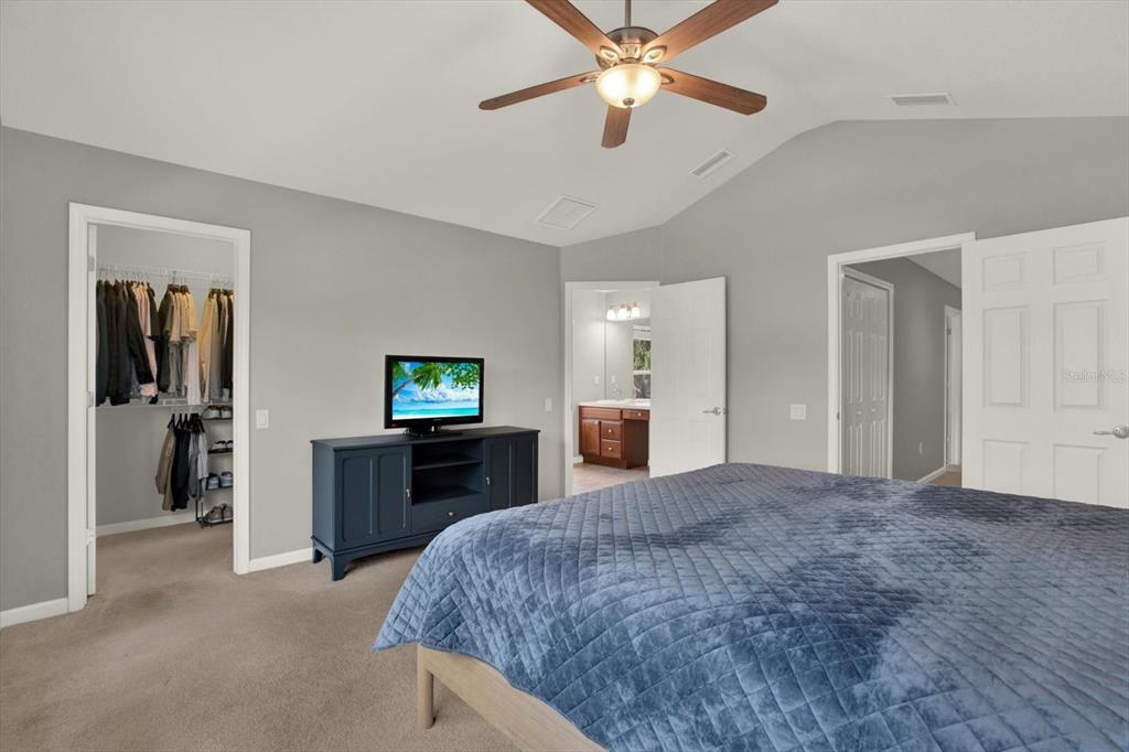 10228 Red Currant Court Riverview, FL 33578 - Photo 21 of 37 a living room with furniture and a flat screen tv