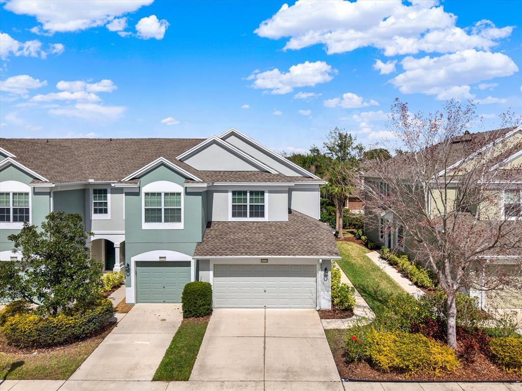 10228 Red Currant Court Riverview, FL 33578 - Photo 33 of 37 a front view of a house with garden