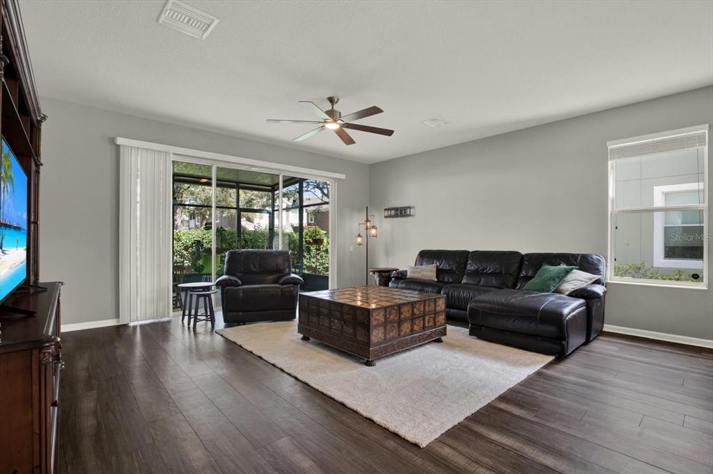 10228 Red Currant Court Riverview, FL 33578 - Photo 8 of 37 a living room with furniture and a window
